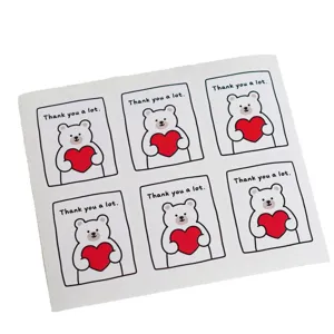 Simpatici adesivi di ringraziamento con orsetto per confezioni regalo e sigilli di prodotti.