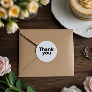 Adhésifs ronds de remerciement pour emballage de cadeaux et fermeture d'enveloppes.