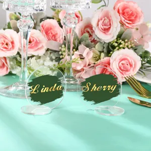 Tarjeta de sitio acrílica transparente redonda con trazo de pincel verde para decoración de boda.