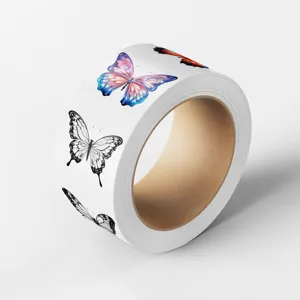 Close-up detail of butterfly sticker roll showing colorful and black-white butterfly patterns.