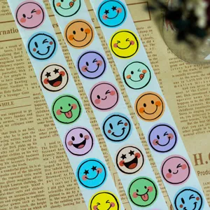 Colorful smiley face reward stickers detail shot, perfect for DIY crafts and gift sealing.