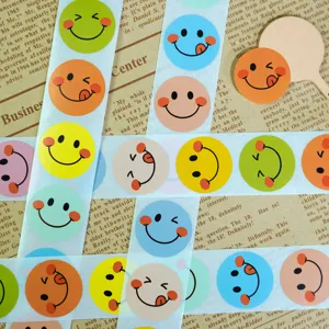 Colorful smiley face reward stickers, round cartoon DIY decorative sealing stickers roll.
