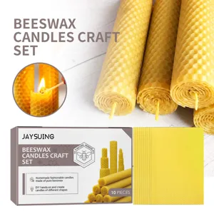 Vue detaillee du kit de fabrication de bougies en cire d abeille avec feuilles et boitier.