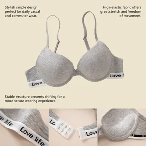Grey seamless padded push-up bra detail view, elastic band and adjustable straps.