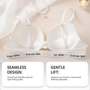 Detail shot of white seamless push-up bra, featuring delicate double straps and printed band.