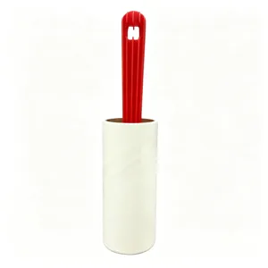 Lint roller with red handle and tearable sticky paper for pet hair removal and daily cleaning.