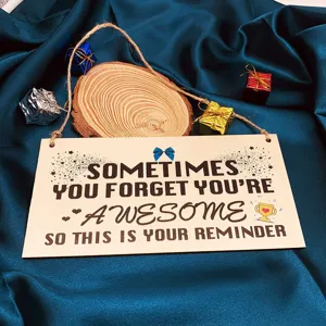 Wood hanging plaque detail featuring inspirational quote and rustic rope design for friendship gift.