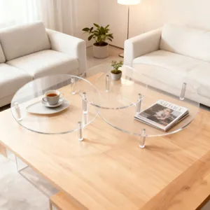 Clear acrylic display risers detail shot showcasing tiered circular shelves on wooden table.