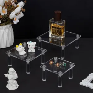 Clear acrylic display stand detail view, perfect for figures, jewelry and desserts.