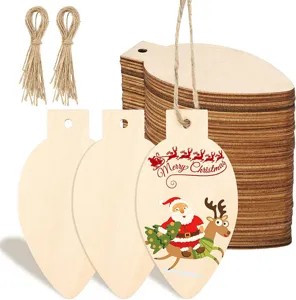 Detailed close-up of unfinished wooden Christmas light bulb tags with twine strings for DIY.