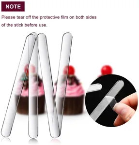Detail view of transparent acrylic popsicle stick with protective film peeling demonstration.