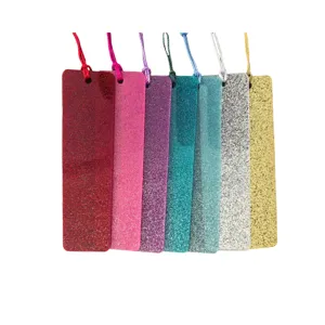 Marcador de libros de acrílico con brillantina y borla DIY blanco decorativo detalle primer plano