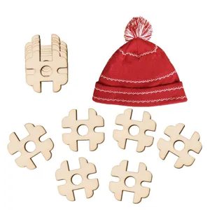 Red knitted winter hat with pom pom and wooden hashtag buttons for DIY crafts and accessories.
