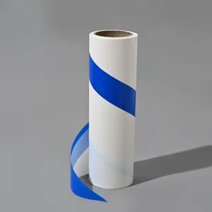Lint roller refill roll, tearable diagonal sticky paper for home hair cleaning detail.
