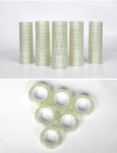 Clear stationery tape detail shot, small adhesive tape rolls for office and school use.