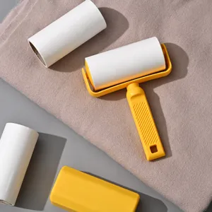 Lint roller for clothes hair removal with refill rolls and protective cover for pet hair cleaning.