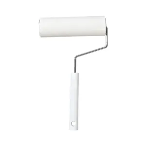 Household lint roller with white plastic handle and sticky paper refill for clothes cleaning.