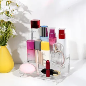 Clear acrylic 3-tier display stand, detailed view showcasing tiered storage for items.