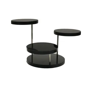 Présentoir multi-niveaux en acrylique noir élégant pour bagues et petits accessoires.