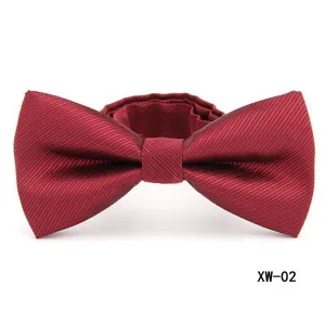 Men formal burgundy striped bow tie detail close up, classic wedding suit accessory view.