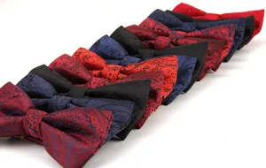 Detail view of men's paisley patterned bow tie, classic vintage jacquard fabric in assorted colors.