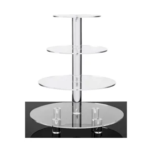 Detailed view of transparent acrylic tier plates and supporting pillars for party display.