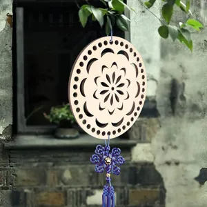 Wooden circular hollow floral pattern base DIY woven supplies and home decor detail view.