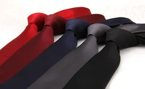 Close-up detail of classic twill patterned formal neckties in various stylish colors.