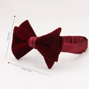 Mens vintage velvet bow tie detail view showcasing premium burgundy fabric and dimensions.