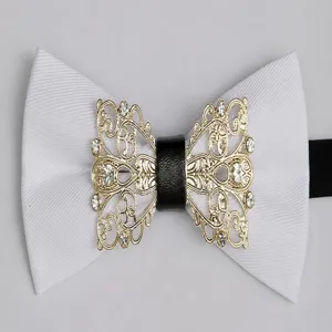 Men wedding white bow tie with ornate gold rhinestone metal centerpiece for formal banquets.