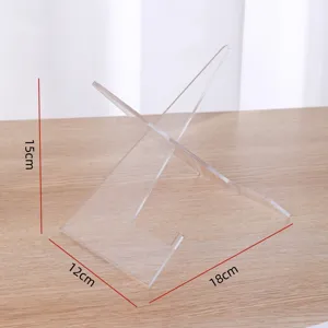 Clear acrylic display stand X-shape bracket for books plates albums and tablets detail view.