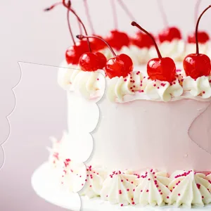 Transparent acrylic cake scraper detail, wavy edge pastry cutter for buttercream frosting baking.