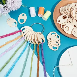 Wooden embroidery floss bobbins detail view, ideal for cross stitch and sewing thread.