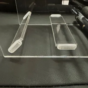 Clear acrylic pen holder detail view, transparent stationery display stand parts for office desk.