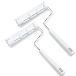 White plastic lint roller handle and metal frame set for efficient pet hair cleaning.