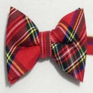 Classic red tartan plaid bow tie for men, perfect for formal events and business casual wear.
