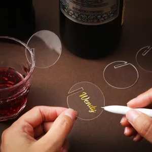 Clear acrylic round drink tags with slot design for wine glasses, perfect for party events.