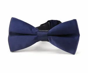Classic solid navy blue men's bow tie detail view, elegant satin fabric formal accessory.