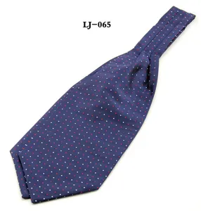 Men's navy blue ascot tie with white and red polka dots classic neckwear detail shot
