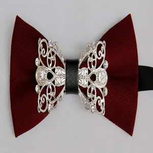Burgundy bow tie detail showing exquisite silver hollow metal piece and rhinestone embellishment.