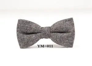 Men's classic herringbone wool bow tie, stylish groom accessory for business and wedding events.