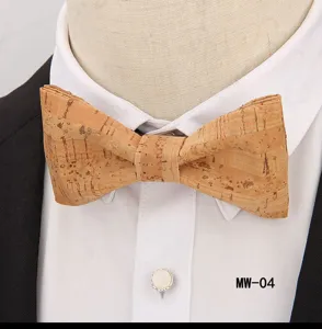 Close up view of a stylish mens casual cork bow tie showing unique texture on white shirt.