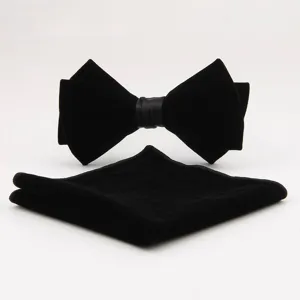 Classic black velvet bow tie and pocket square set for men, elegant wedding groom formalwear accessory.