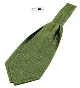 Green polka dot ascot tie detail view, elegant silk cravat fabric texture close-up show