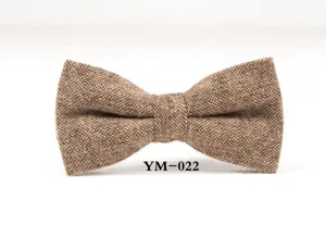 Detail shot of the brown wool bow tie, showing fine tweed texture and neat stitching.