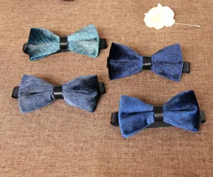 Men's velvet bowtie detail, stylish printed bow tie for wedding evening suits and formal wear.