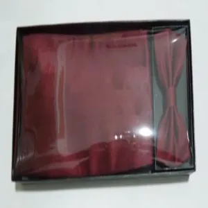 Mens wine red cummerbund and bow tie formal set packaged in a classic black box for wedding.