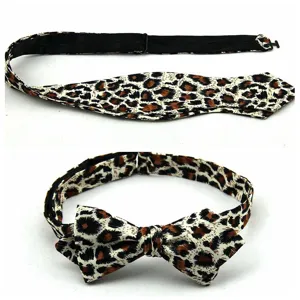 Leopard print bow tie detail showing adjustable black strap and textured fabric pattern.