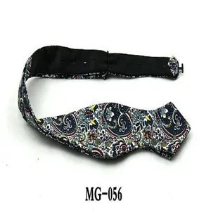 Detailed closeup view of men's paisley floral bowtie with adjustable strap for business wear.
