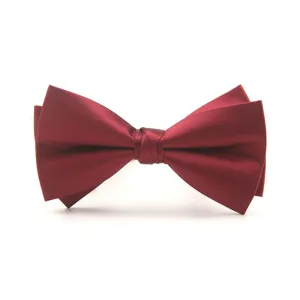 Wine red double layer satin bow tie detail, elegant groom and formalwear accessory.